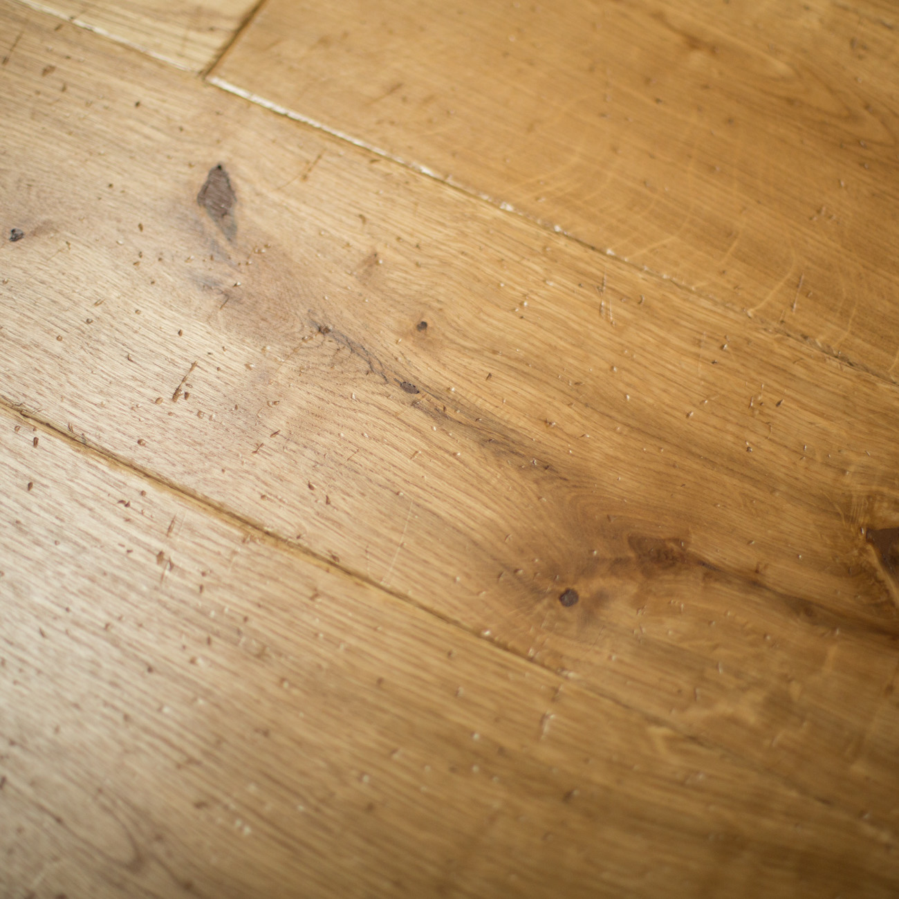 Distressed engineered oak flooringGolden Sandringham